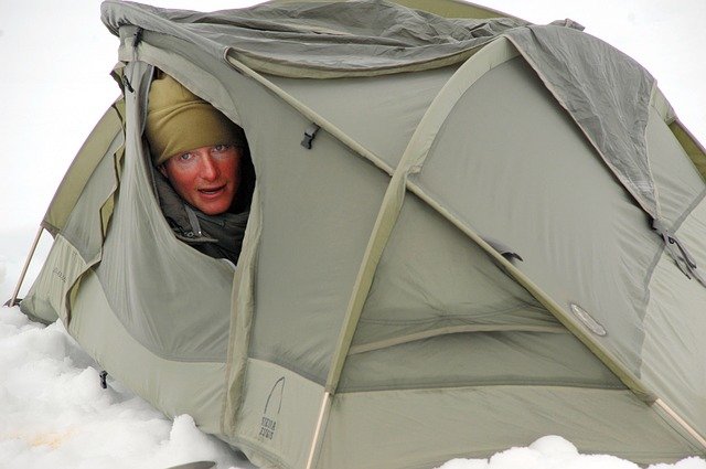 How do you keep warm camping in a tent?